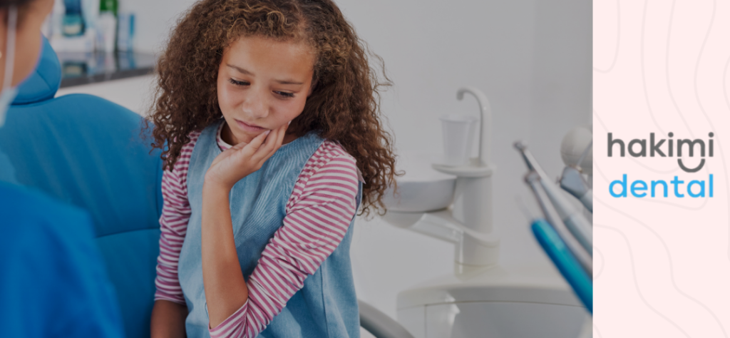 children's tooth decay - child at the dentist with tooth pain